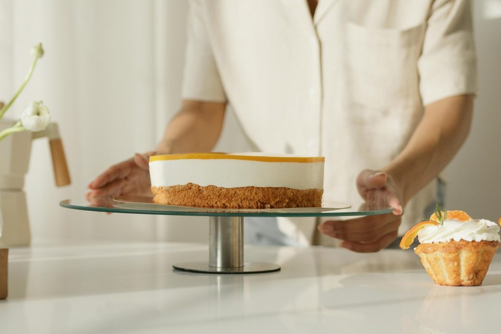 A woman finishing up her cake, one of the food hustles