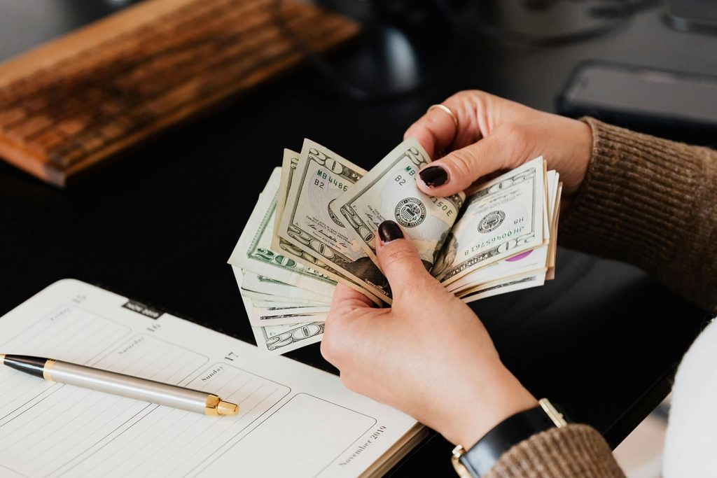 Woman counting her money