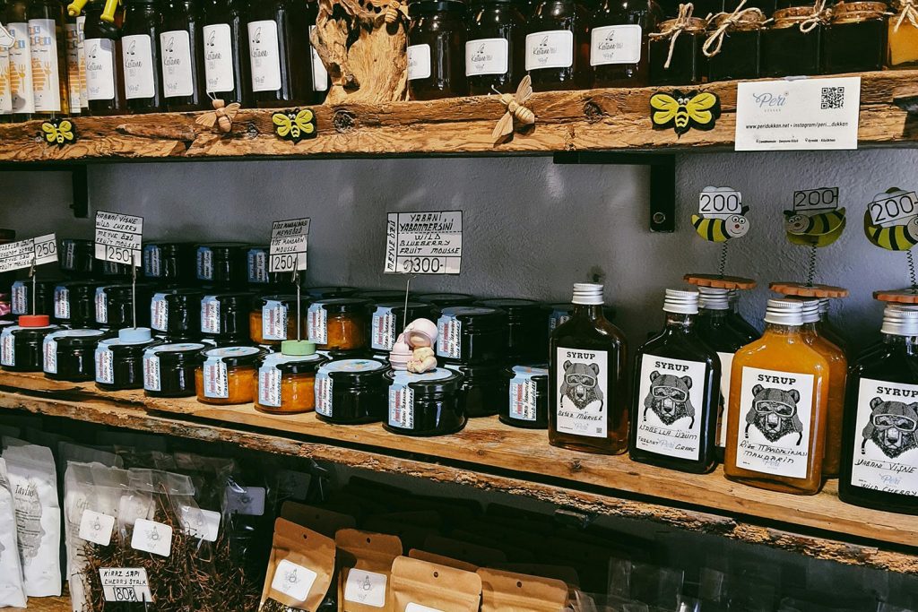 A display of jelly and jam on a shelf