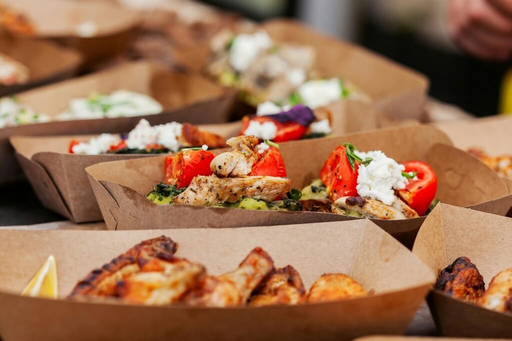 Meal being prepped in advanced at a food pop up outside