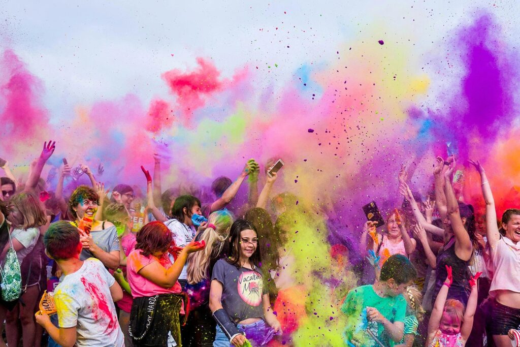 Several people at a color party event