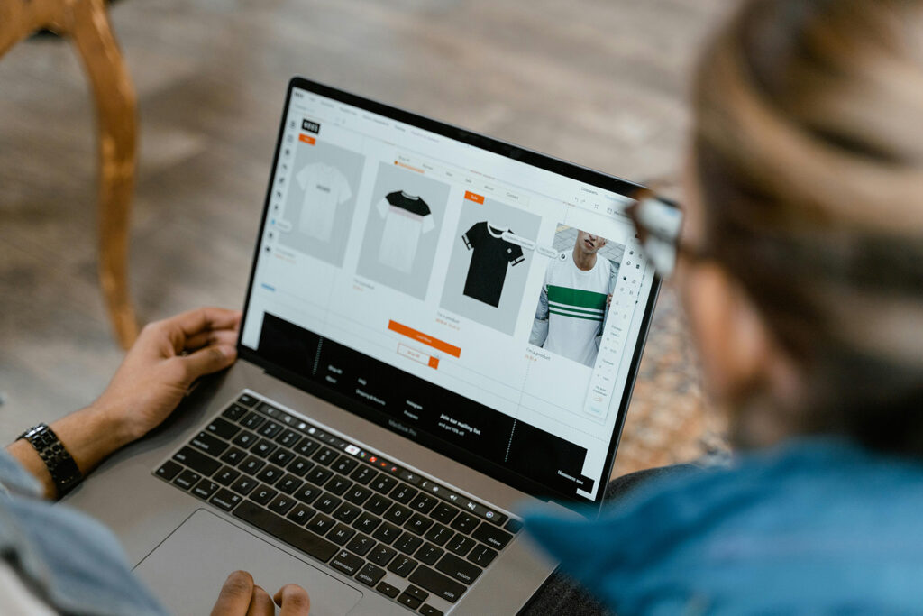 Woman looking at a t-shirt design platform online