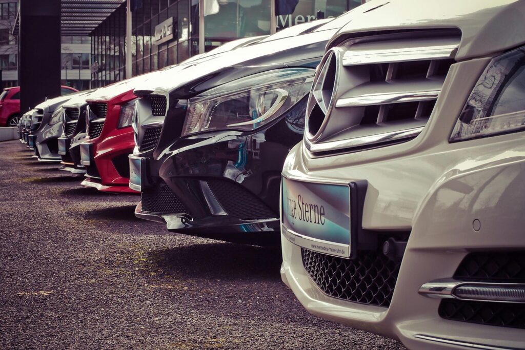Several cars at a car rental place