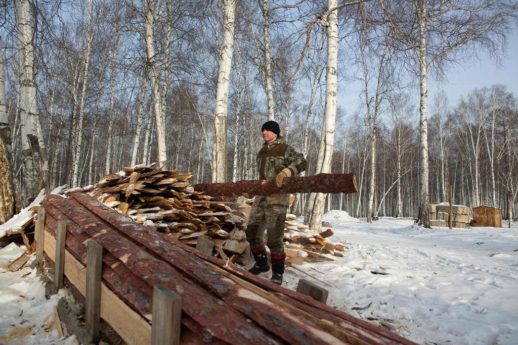 Man working in snow, winter services