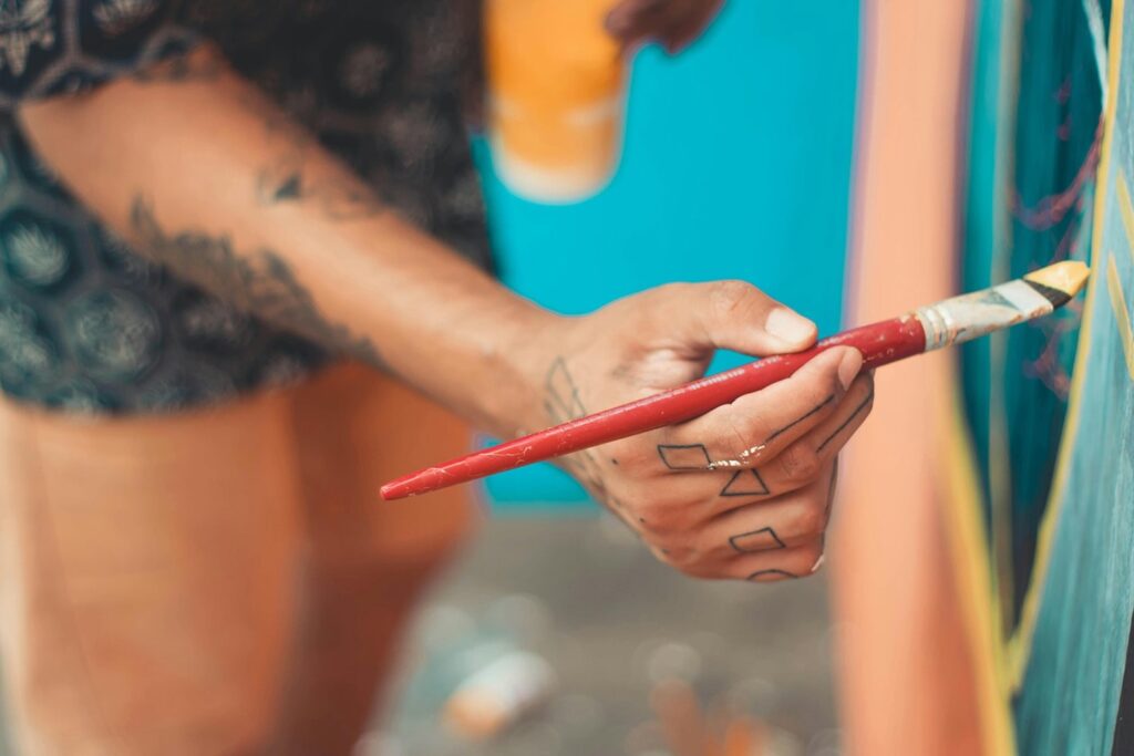 Woman painting on canvas